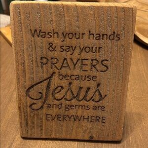 Wood “wash your hands & say your prayers because Jesus and germs are everywhere
